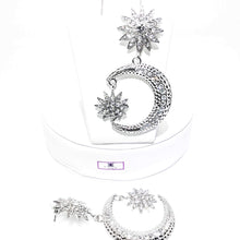 Jadas Crescent Moon Earrings