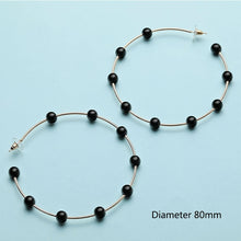 Elegant White/Black Simulated Pearls Statement Earrings
