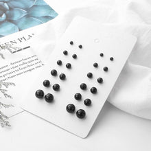 Elegant White/Black Simulated Pearls Statement Earrings