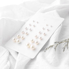 Elegant White/Black Simulated Pearls Statement Earrings