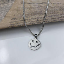 Kpop crooked smile face pendant